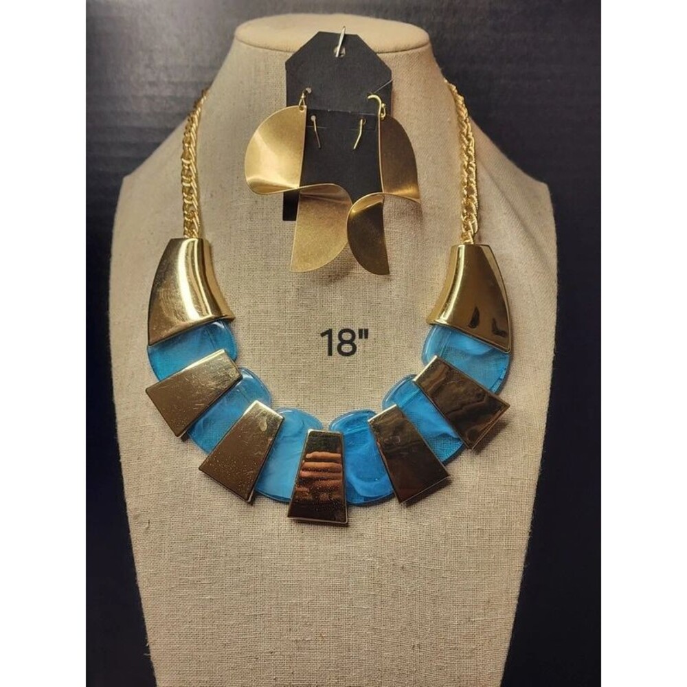 33. Bold geometric necklace and matching earring s
